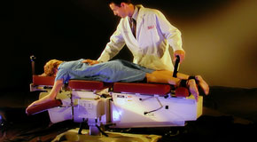 This is a picture of Cox Technic chiropratic spinal manipulation as performed at Apple Country Chiropractic.